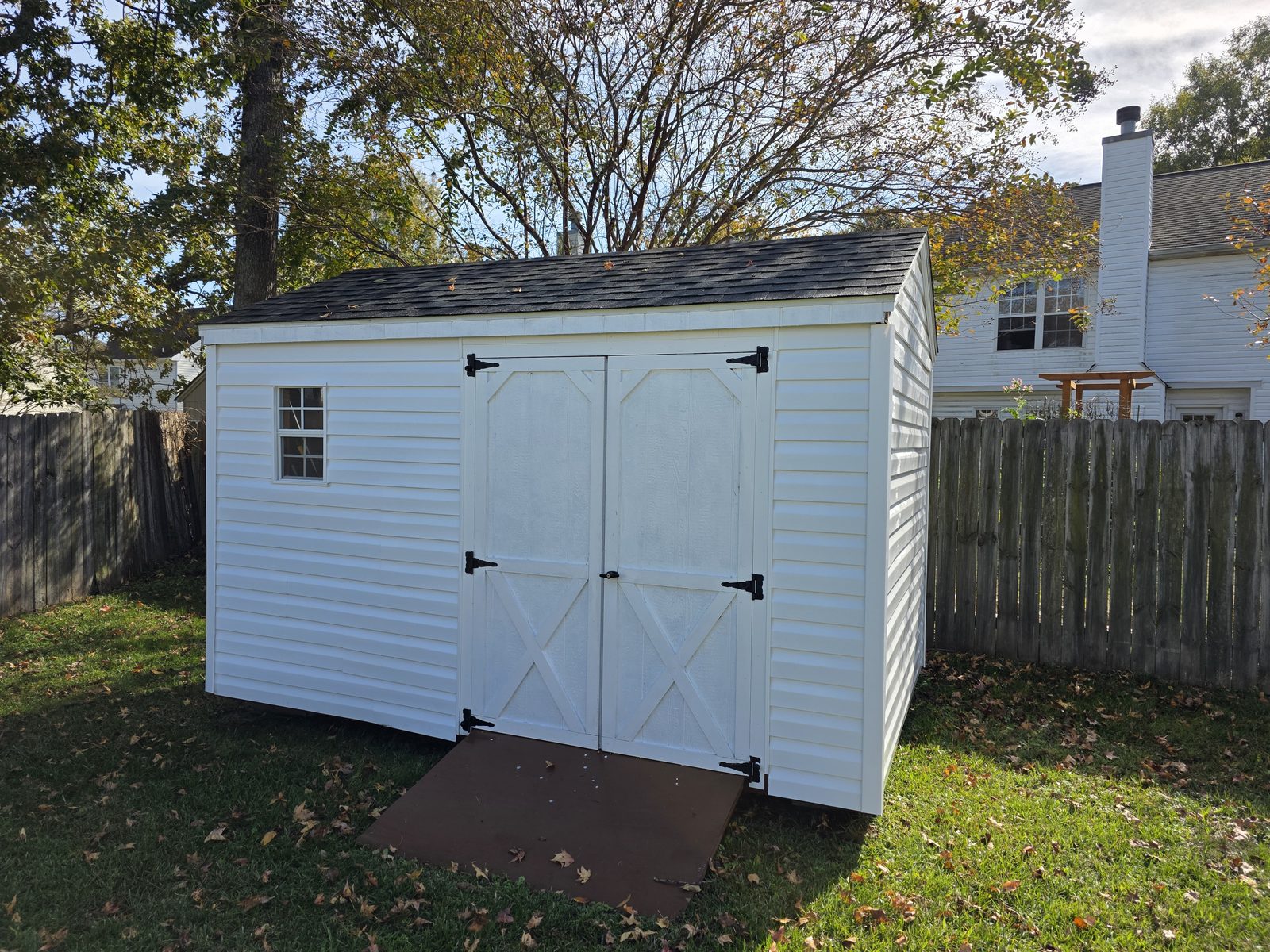 The same backyard shed after cleaning.